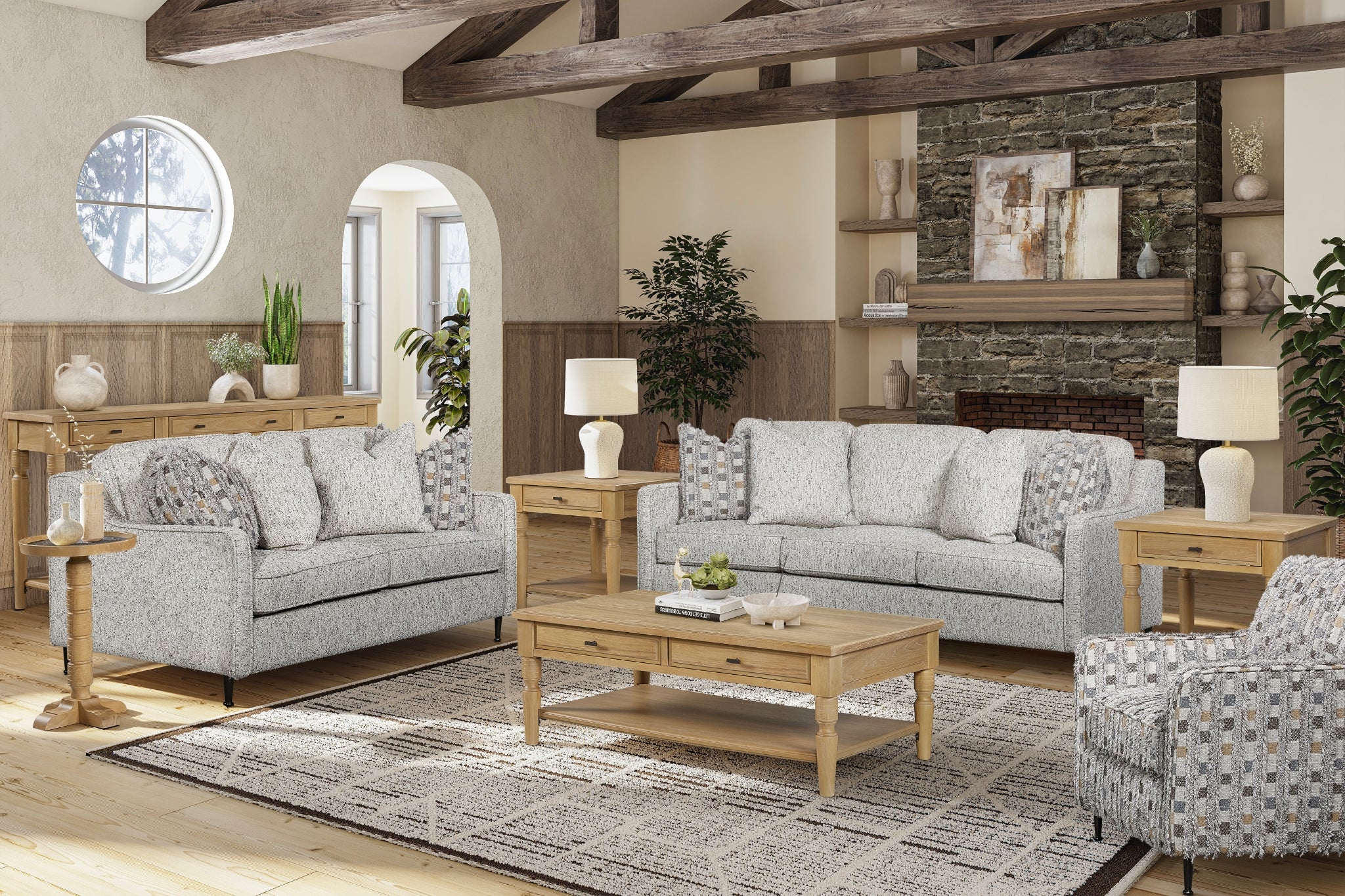 Living room with gray sofas, wooden coffee table, and decorative elements.